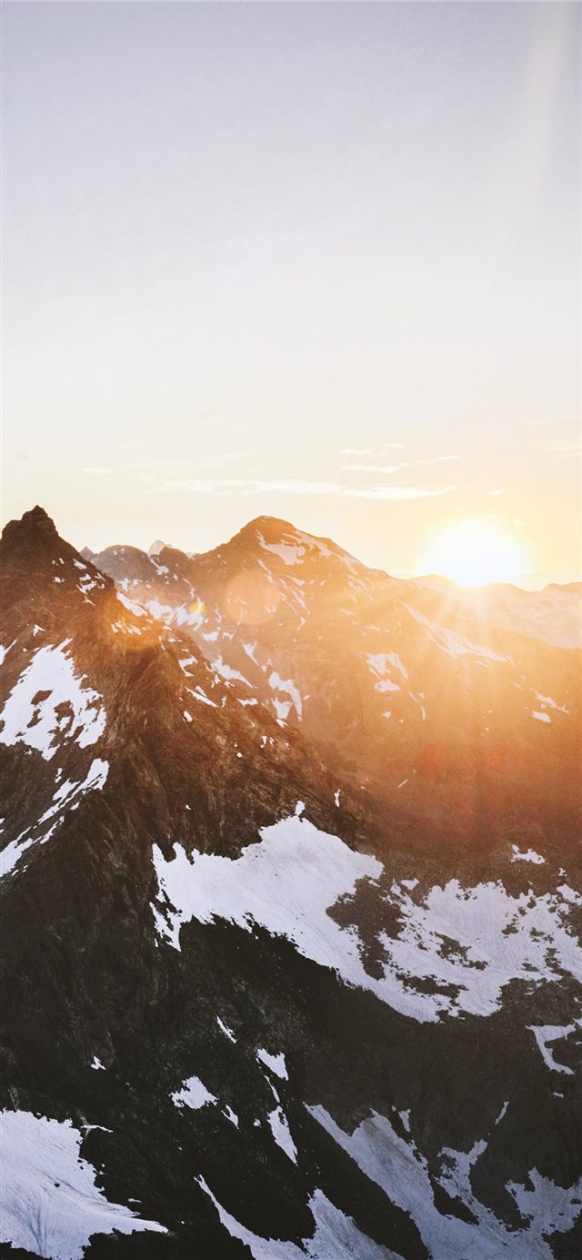 mountain with snow during daytime iPhone X wallpaper 