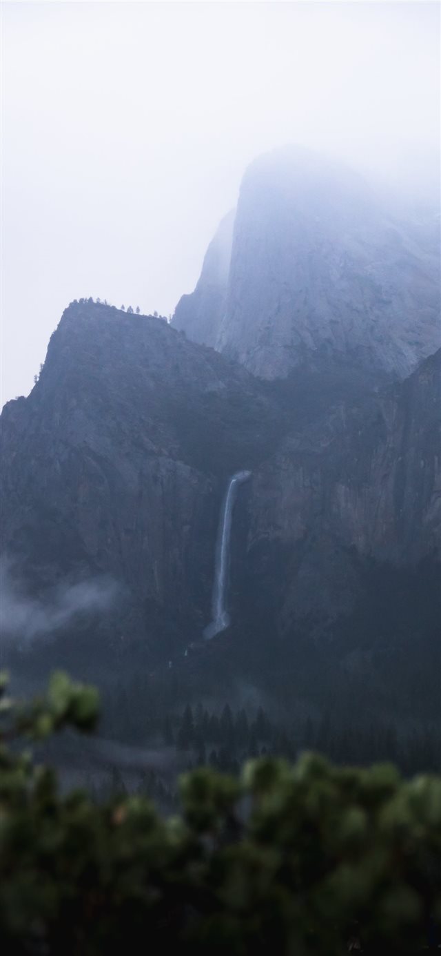 waterfall in mountain cliff iPhone 11 wallpaper 