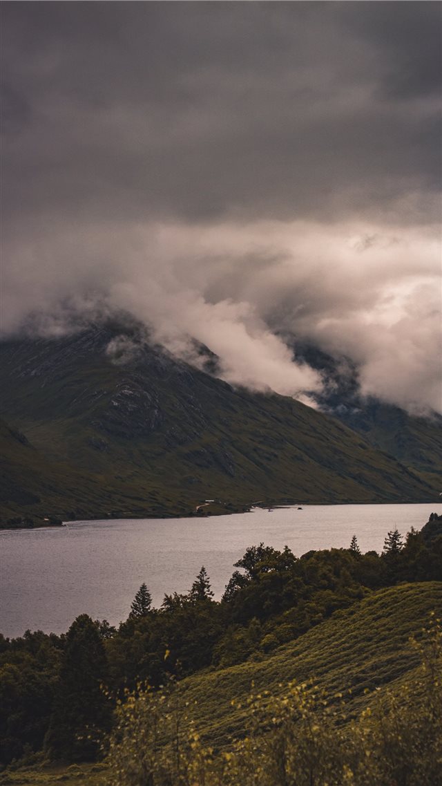 white clouds covering mountain during daytime iPhone 8 wallpaper 