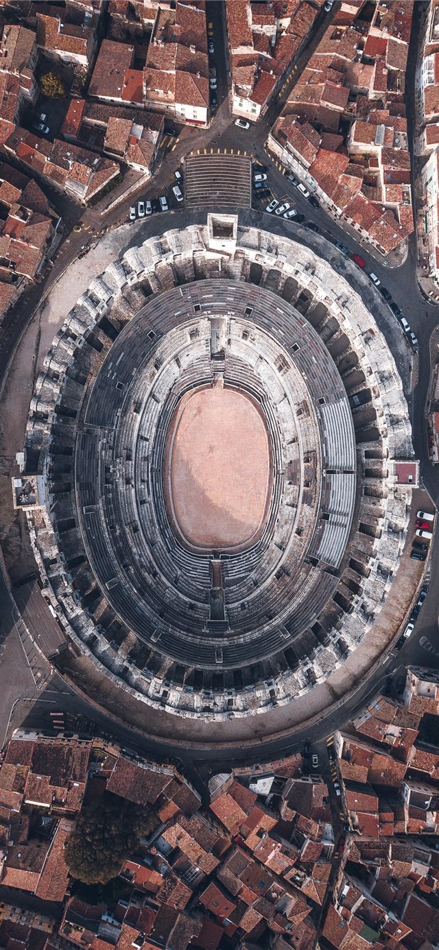 aerial view of stadium during daytime iPhone X wallpaper 