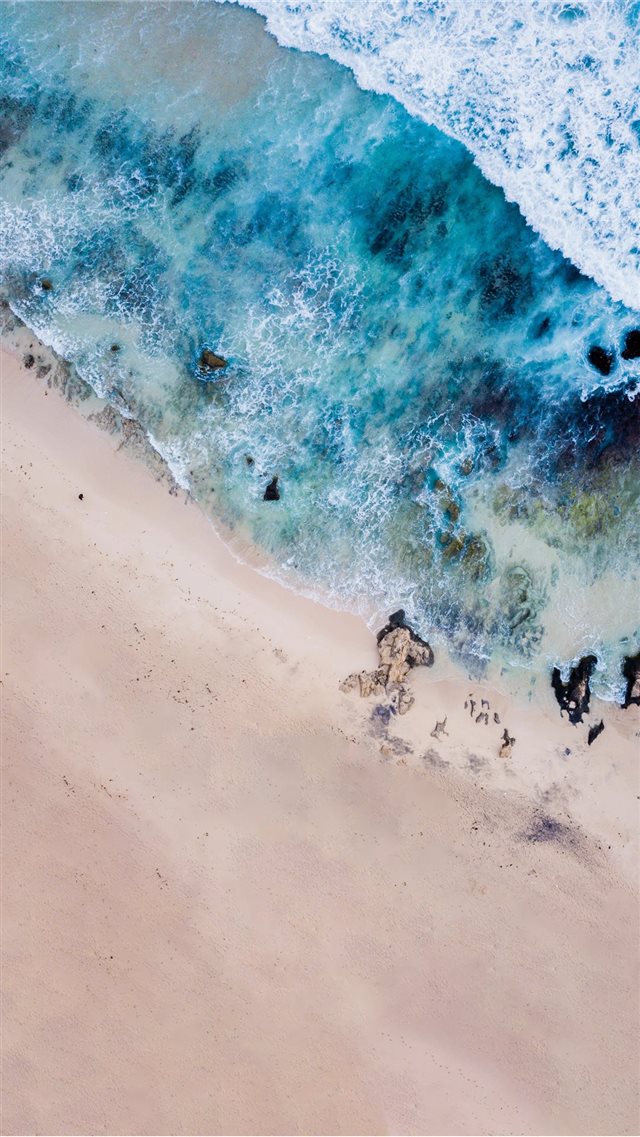 bird's eye photography of body of water near shore iPhone 8 wallpaper 