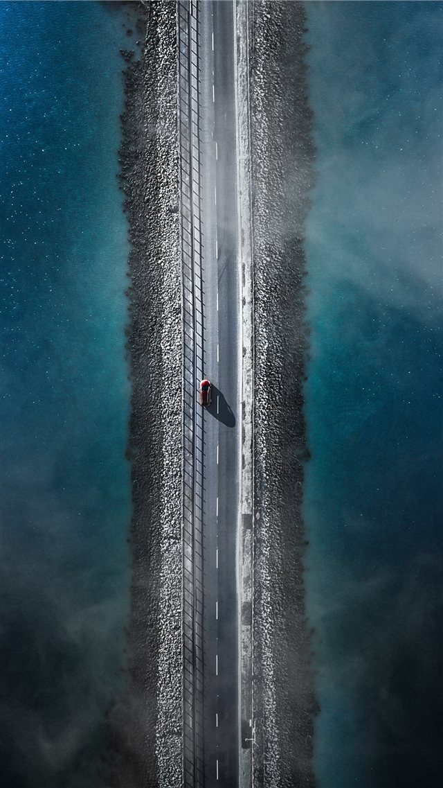 bird's eye view photo of car on asphalt road betwe... iPhone 8 wallpaper 