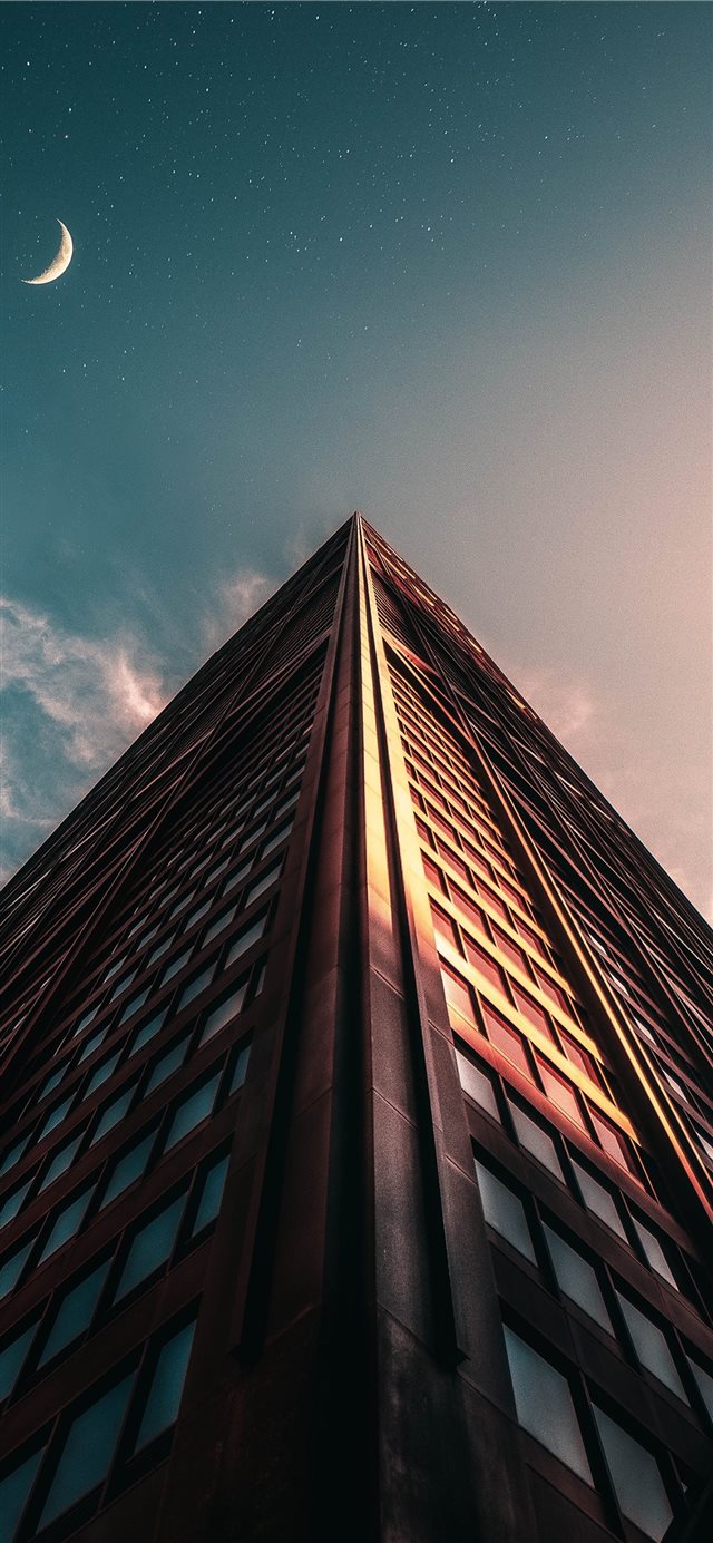 brown high rise building iPhone X wallpaper 
