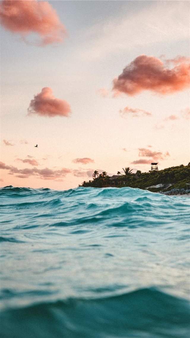clear sky over body of water iPhone 8 wallpaper 