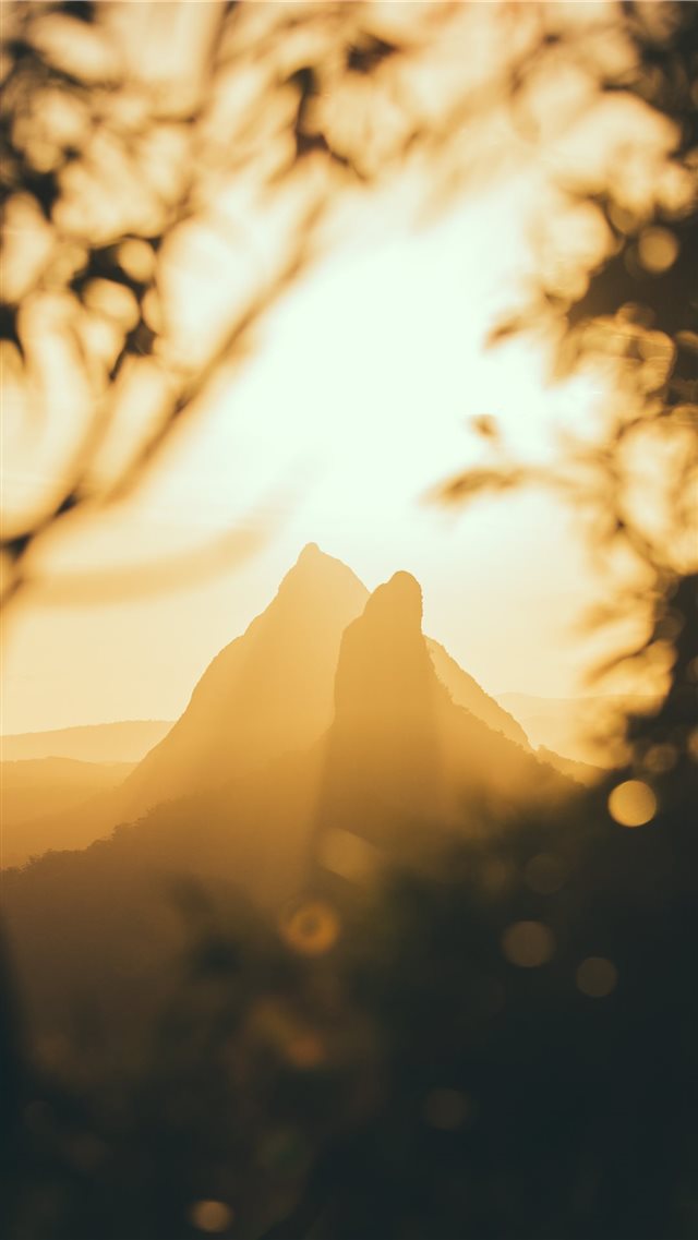 mountains under golden hour iPhone 8 wallpaper 