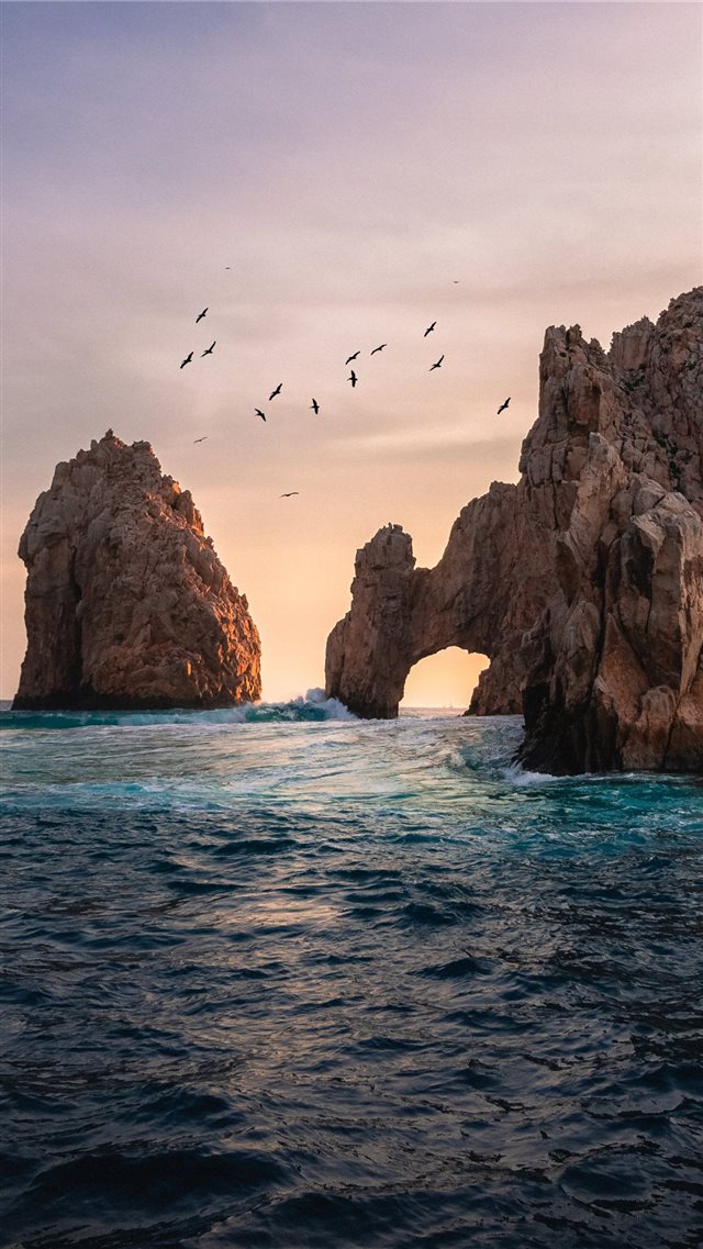 rock formation on the ocean photography iPhone 8 wallpaper 