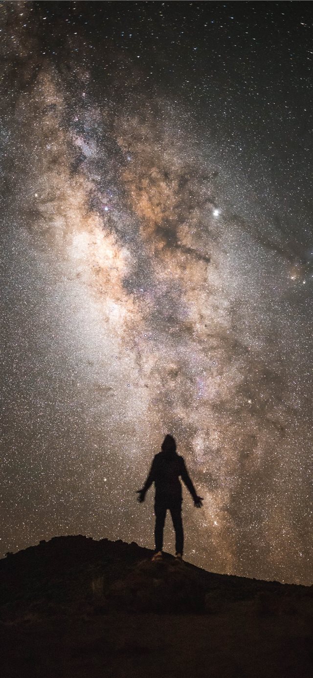 silhouette of a man with the Milky Way background iPhone 11 wallpaper 