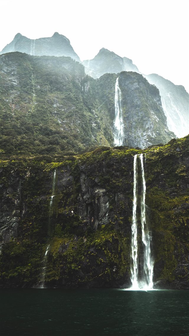 waterfalls under white sky iPhone 8 wallpaper 