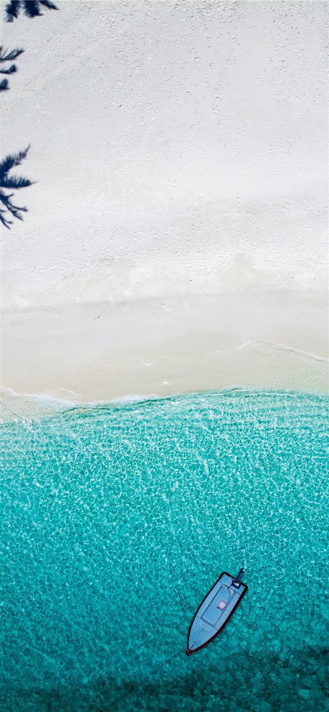 aerial photography blue boat near shore iPhone X wallpaper 