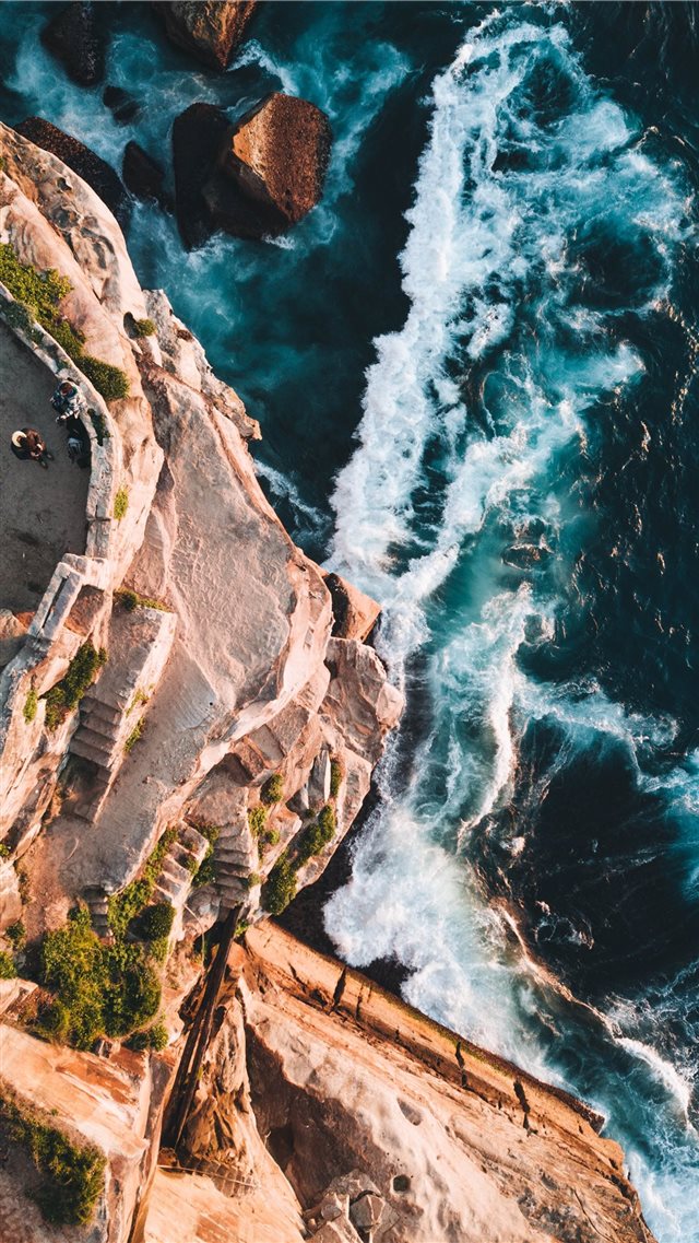 aerial photography of rocky mountain and beach iPhone 8 wallpaper 