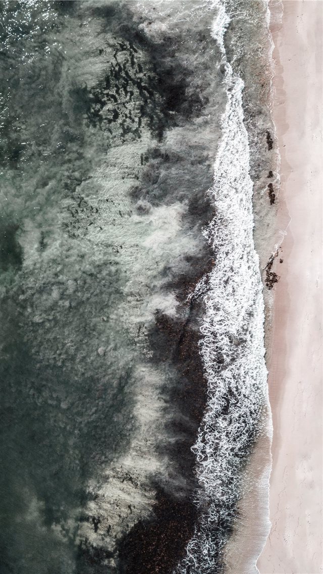 aerial view of crashing waves iPhone 8 wallpaper 