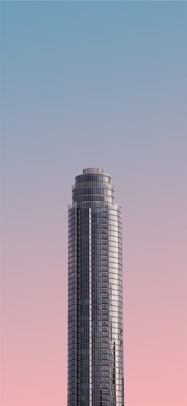 gray tower building under blue sky iPhone X wallpaper 