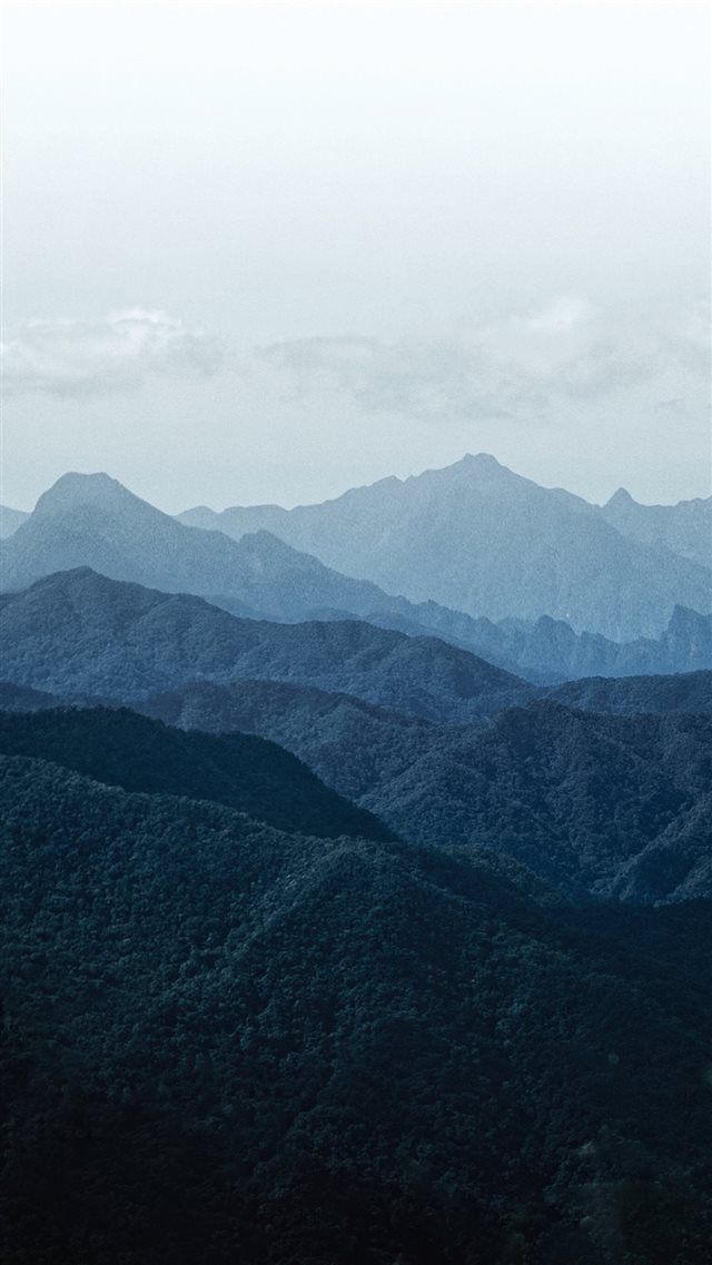 green mountains under white sky during daytime iPhone 8 wallpaper 