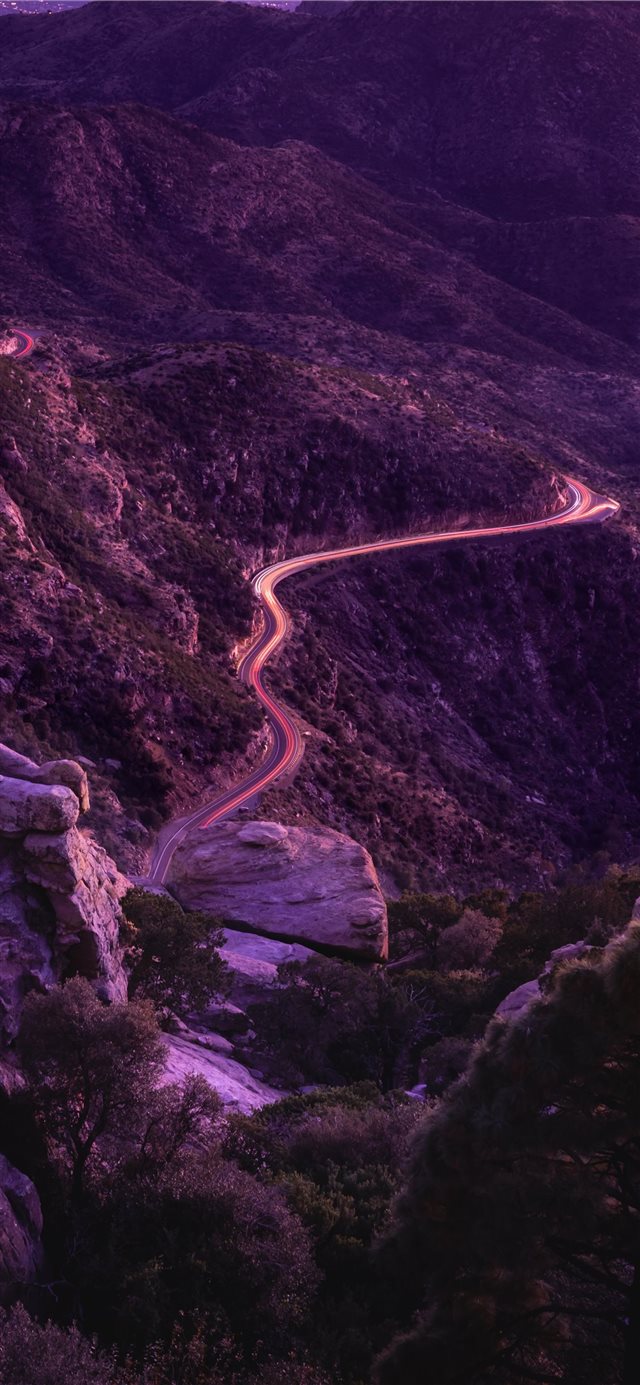 road on mountain ridge iPhone 11 wallpaper 