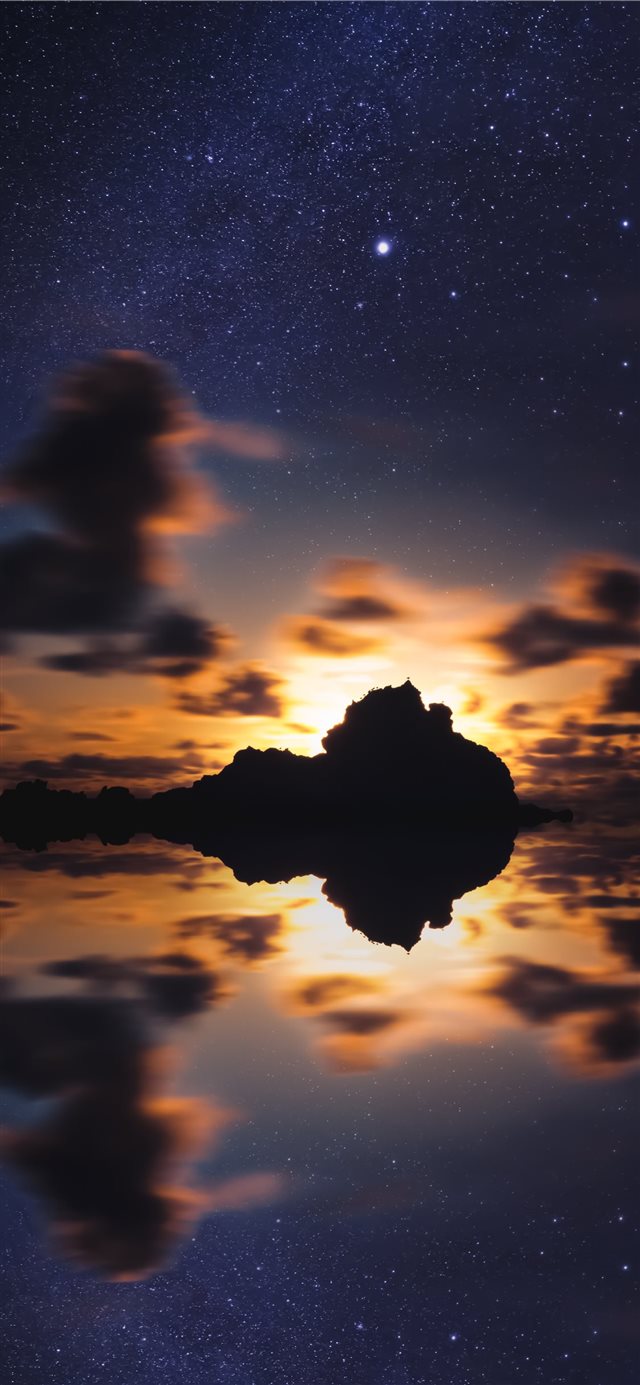 silhouette of islet during golden hour iPhone X wallpaper 