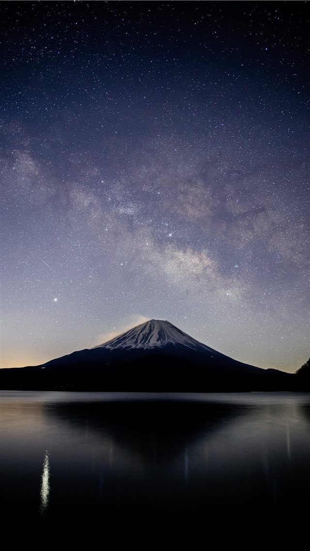 snow covered mountain near lake under starry night iPhone 8 wallpaper 