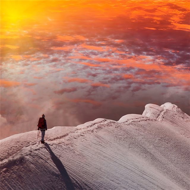 standing at snowy peak mountain sunset iPad wallpaper 