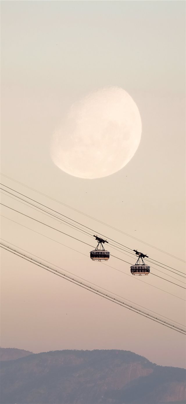 two black cable cars iPhone 11 wallpaper 