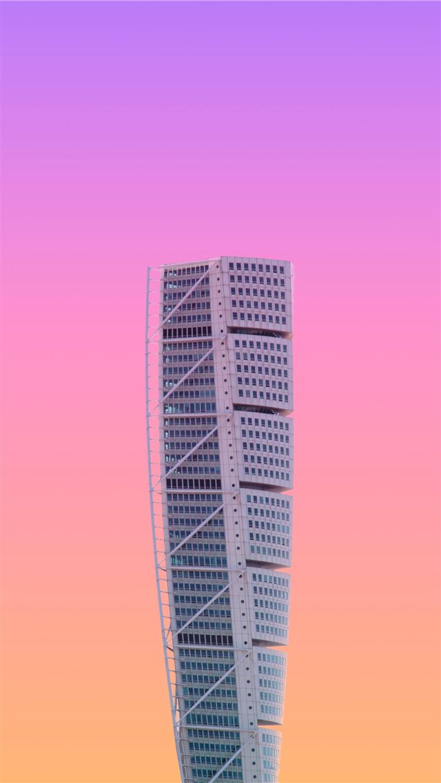 white high rise building under a purple sky iPhone 8 wallpaper 