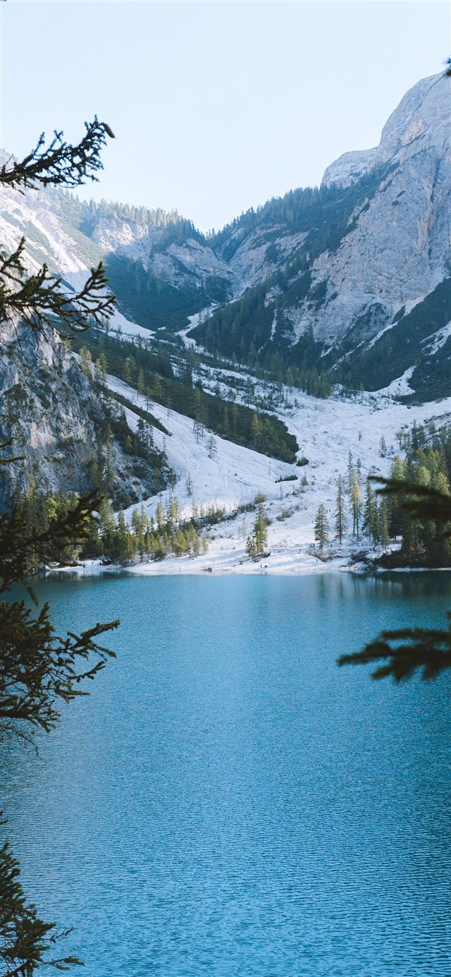blue calm lake by the icy mountain iPhone 11 wallpaper 