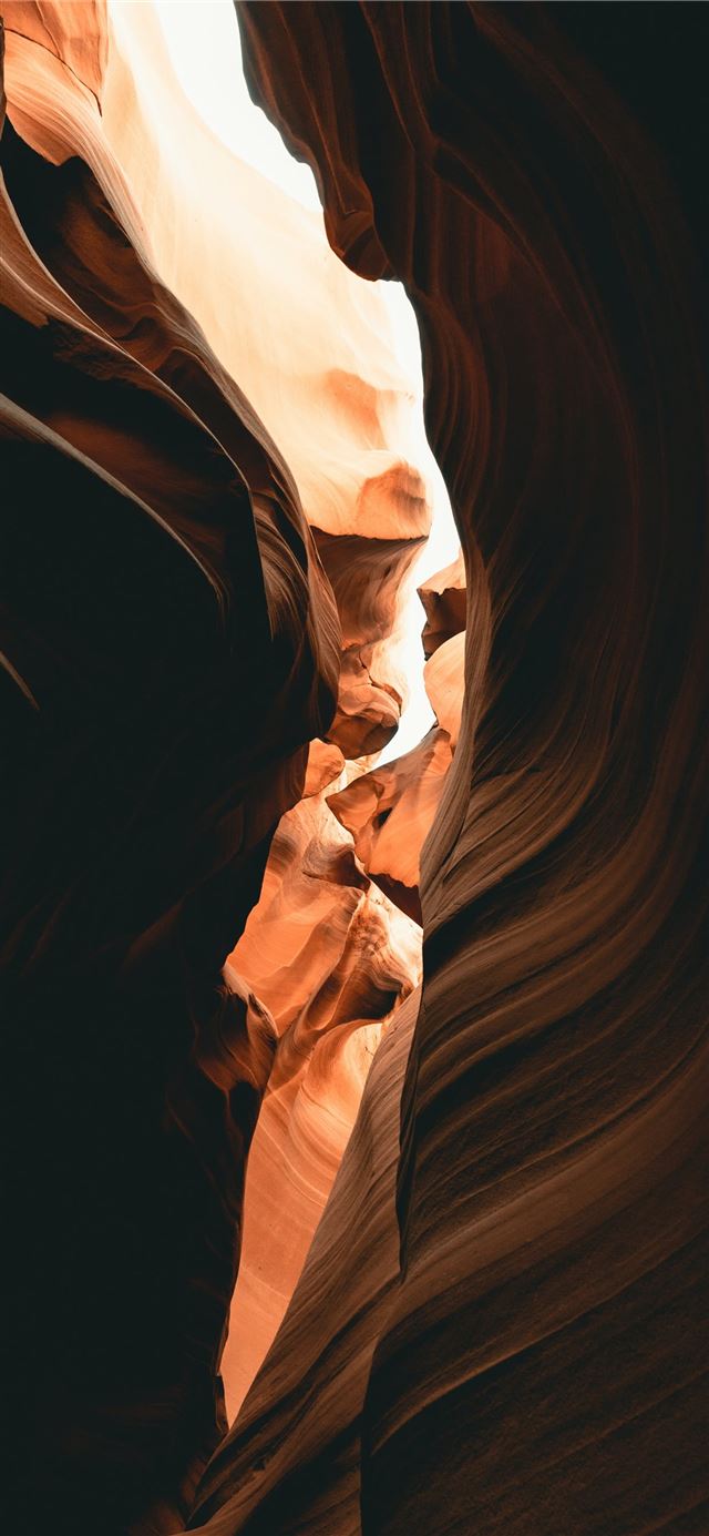 brown rock formation during daytime iPhone X wallpaper 