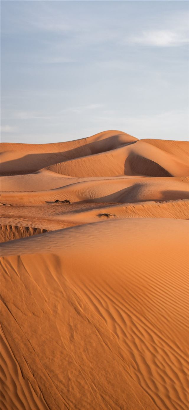 brown sand under blue sky during daytime iPhone 11 wallpaper 