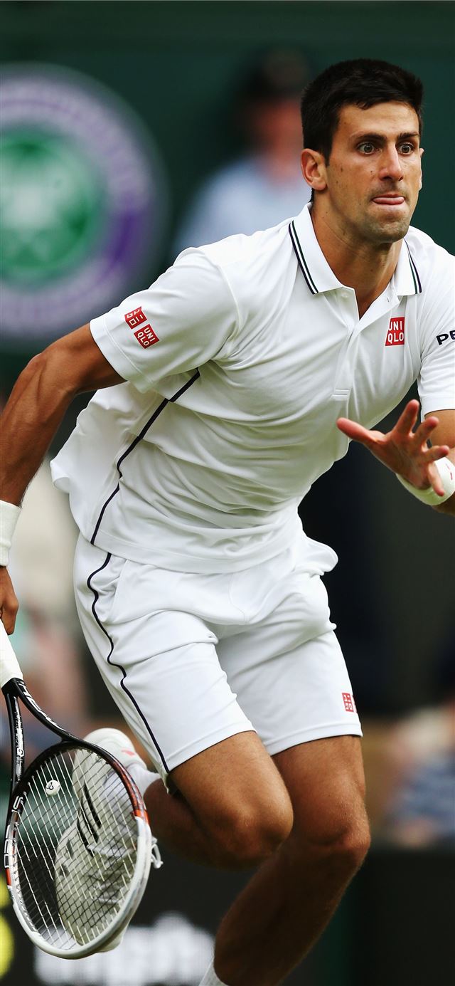 Novak Djokovic of Serbia chases down a ball during... iPhone 11 wallpaper 