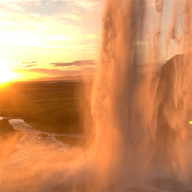 sunset from waterfall behind iPad wallpaper 