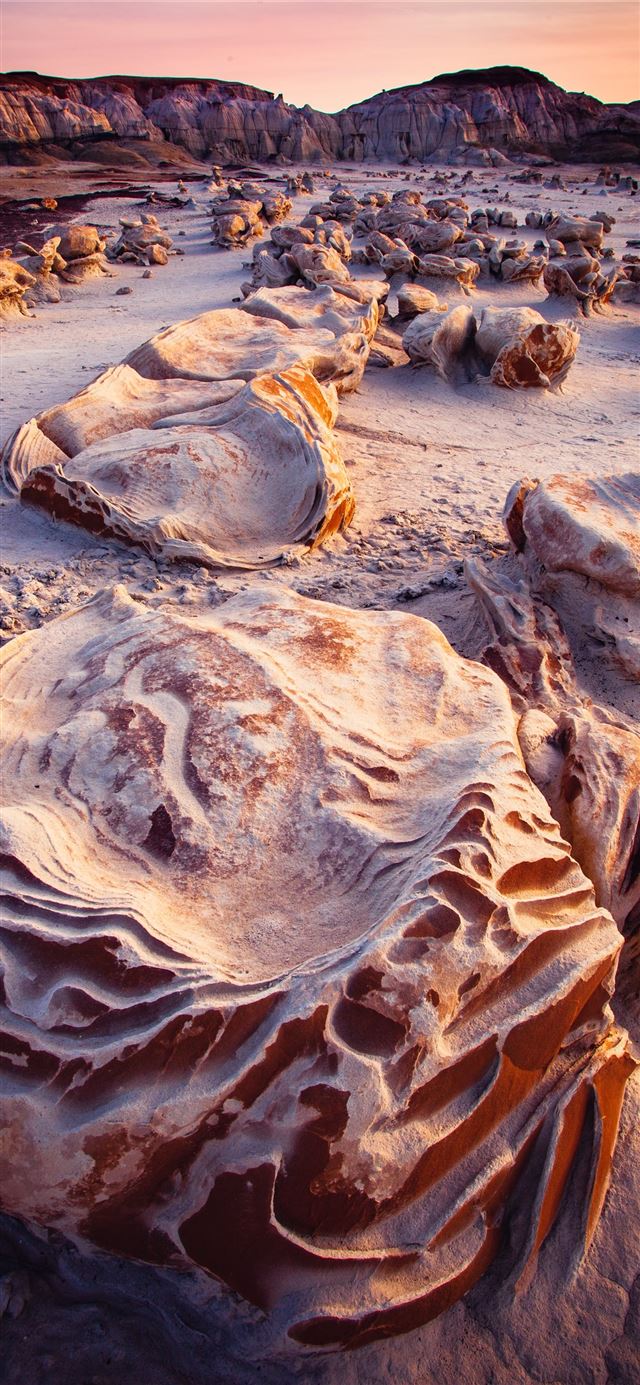 brown rock formations iPhone X wallpaper 