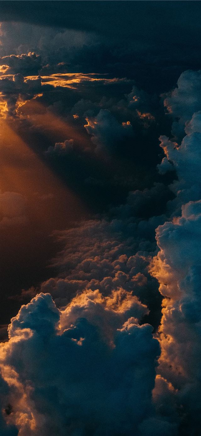 clouds during golden hour iPhone 11 wallpaper 