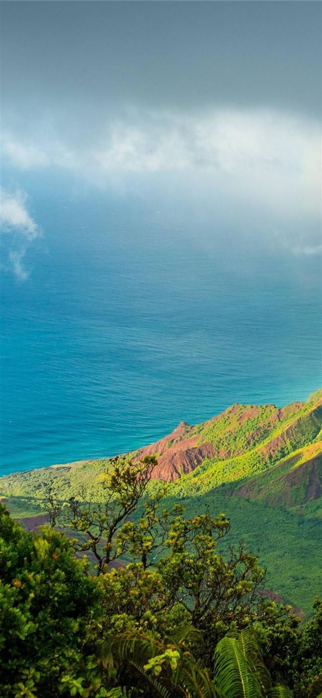 Hawaii Kauai Pacific Ocean Clouds Mountains 4k Son... iPhone X wallpaper 