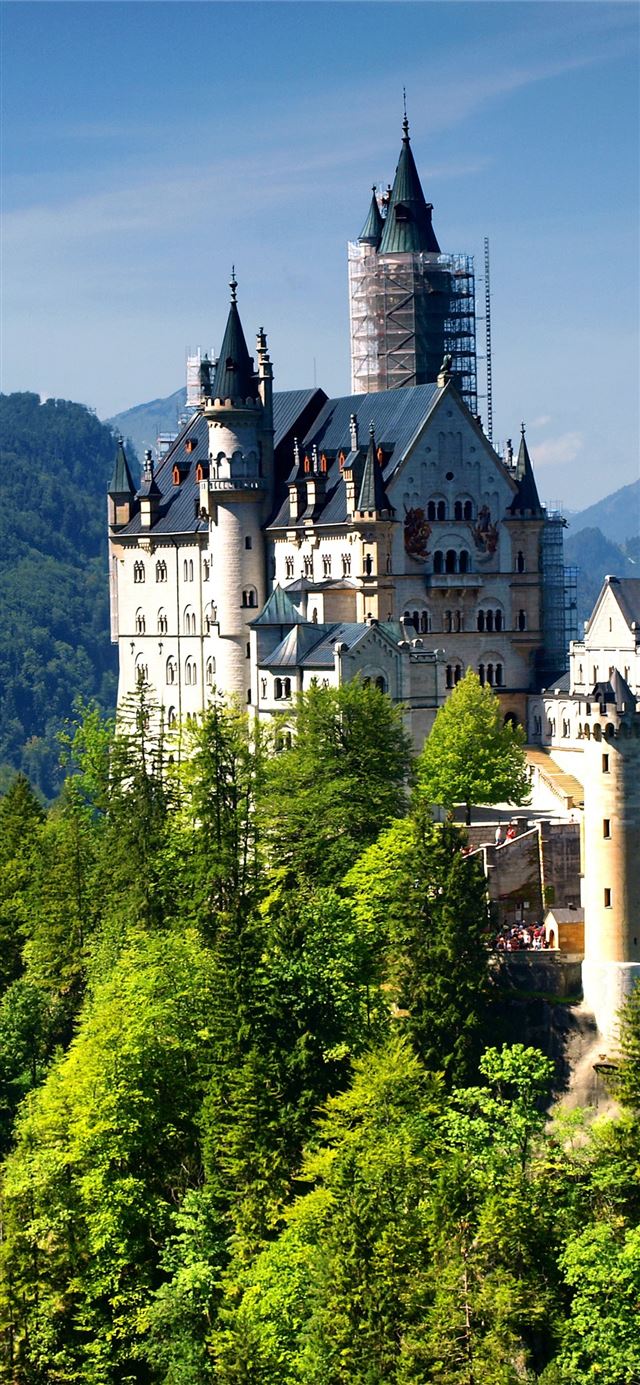 Neuschwanstein Castle Bavaria Germany Alps mountai... iPhone X wallpaper 