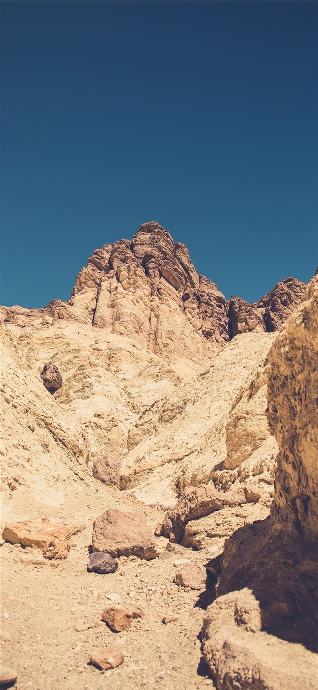 rocky views of mountain cliffs in death valley nat... iPhone 11 wallpaper 