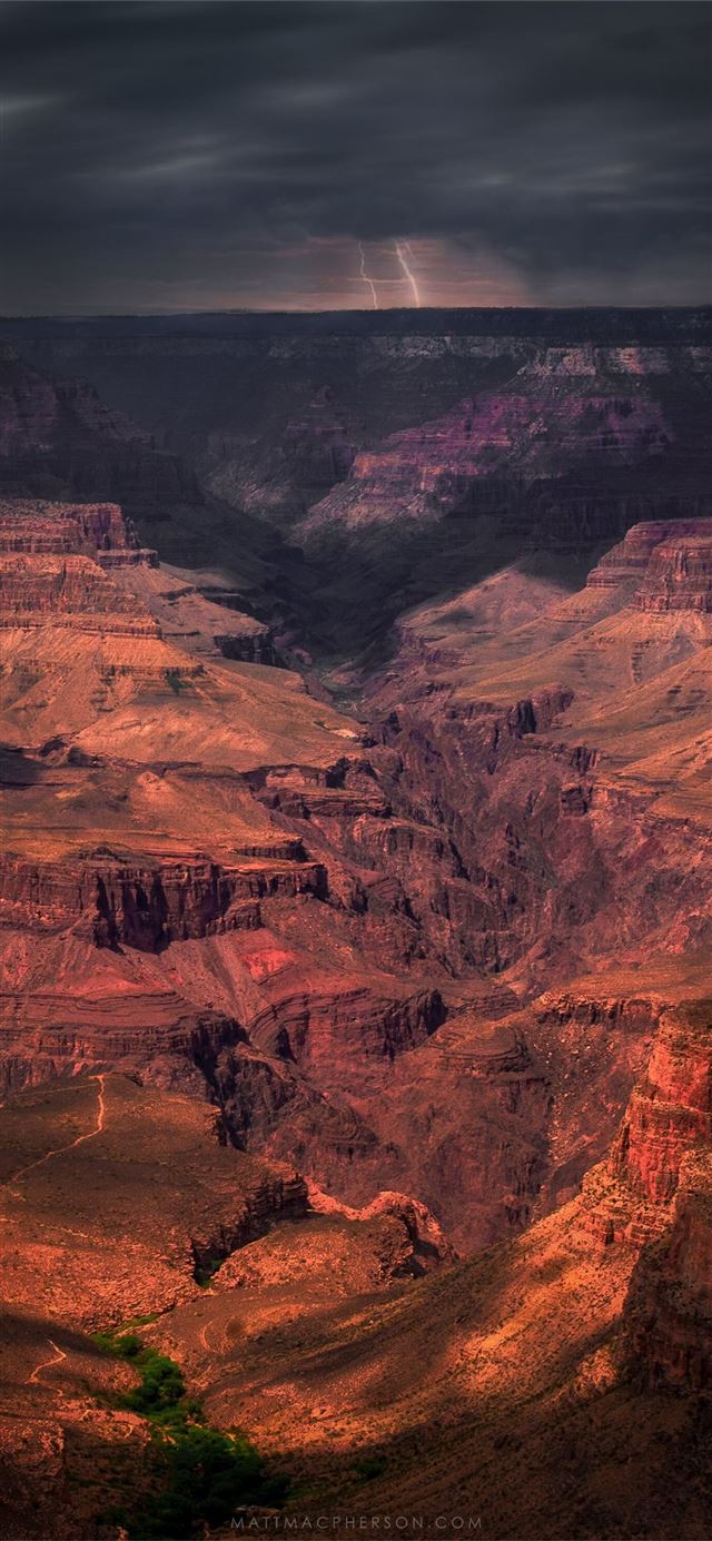 storm passing through the grand canyon iPhone 11 wallpaper 