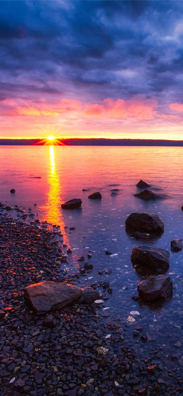 sunrise at seal rock iPhone X wallpaper 