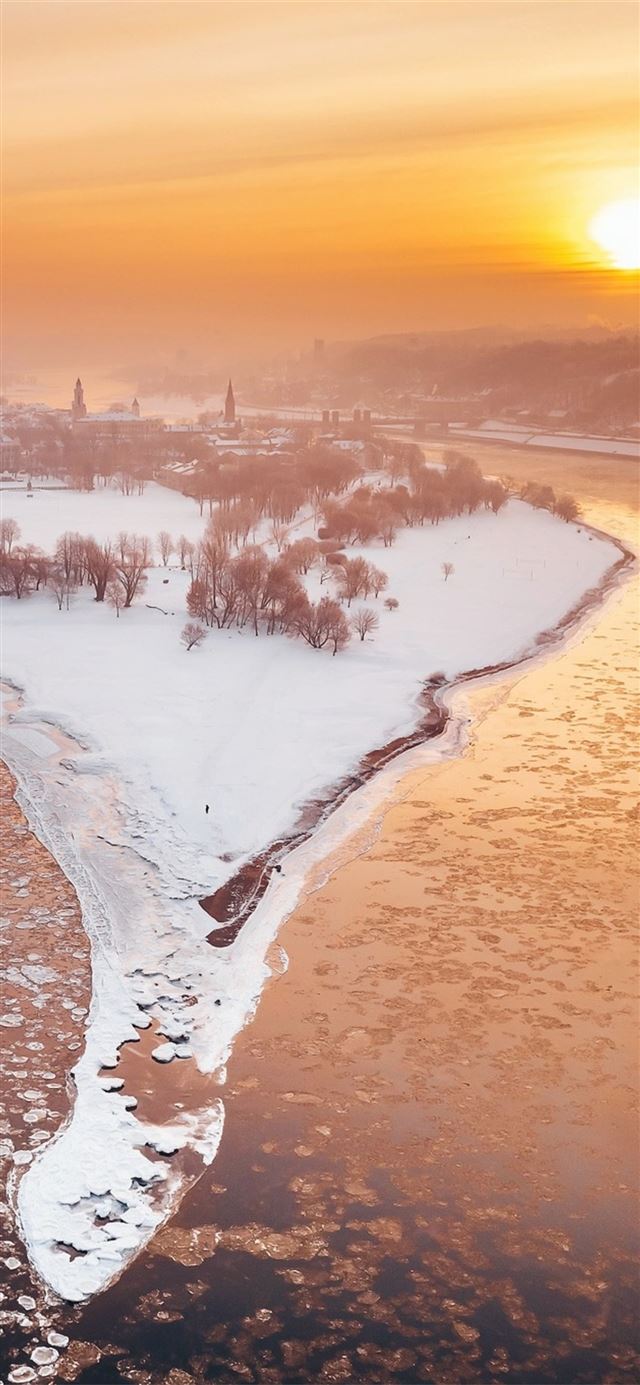 kaunas river city winter snow sunlight iPhone 11 wallpaper 