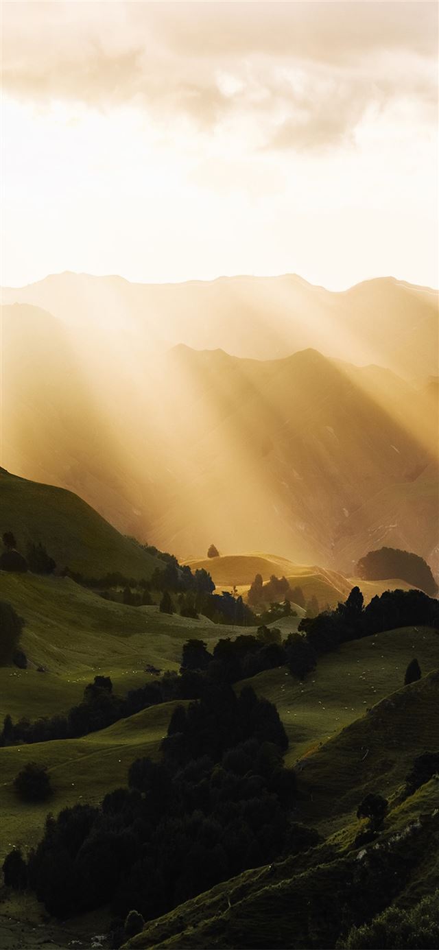 sunbeams morning mountains iPhone X wallpaper 