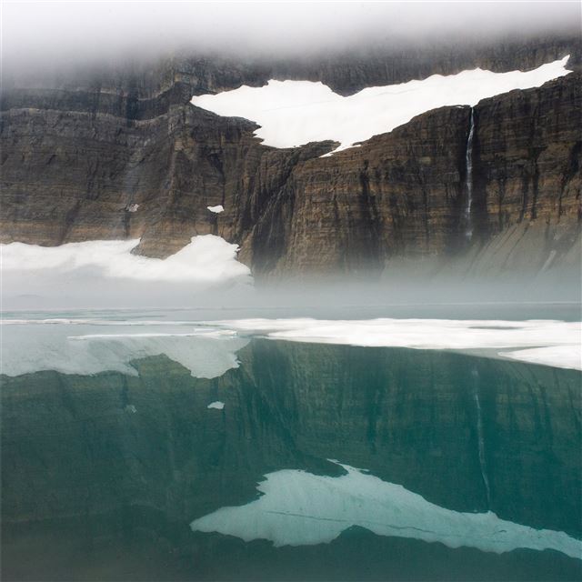 calm blue reflections grinnell lake at glacier nat... iPad Air wallpaper 