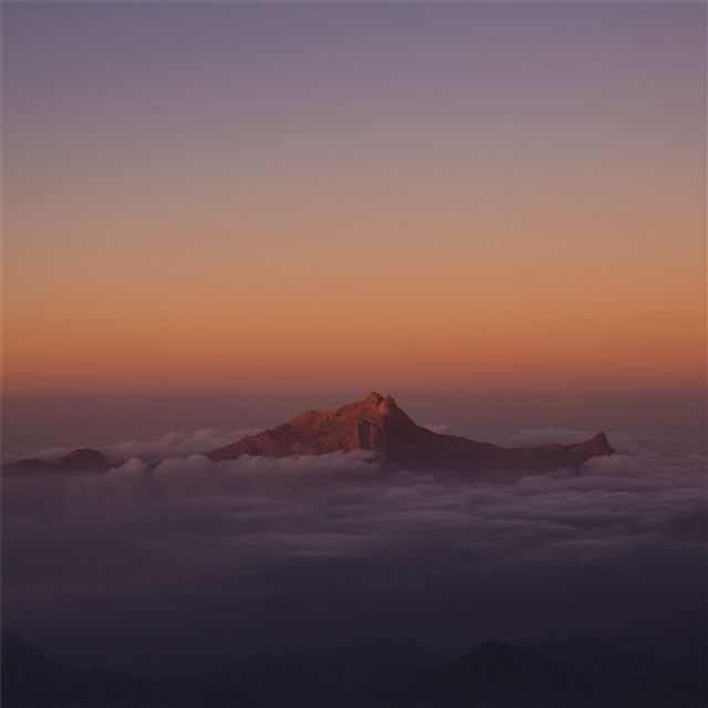 mountain peak from clouds 5k iPad Air wallpaper 