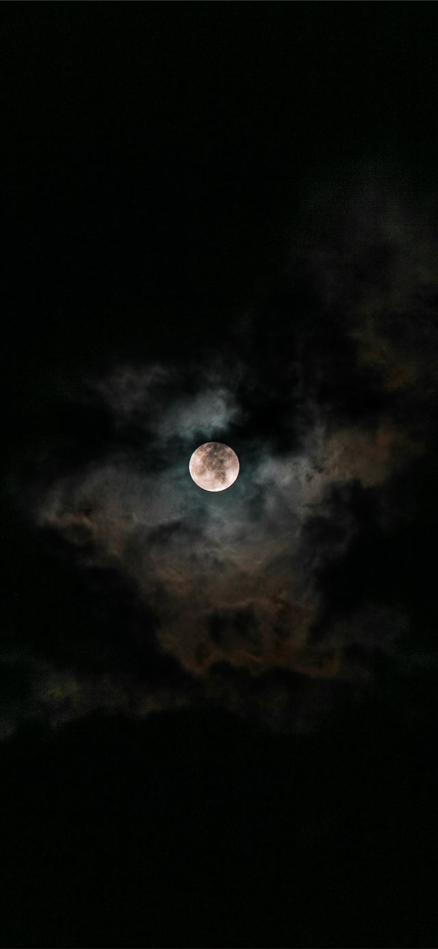 moon covered with clouds at nighttime iPhone 11 wallpaper 