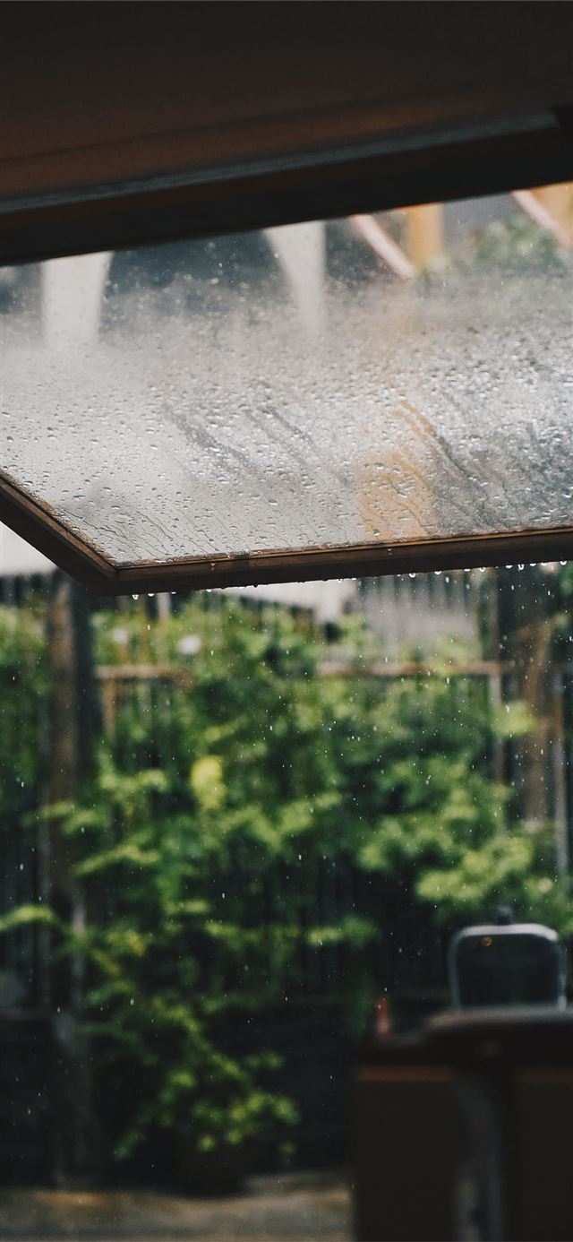 rain drops on window glass iPhone 11 wallpaper 