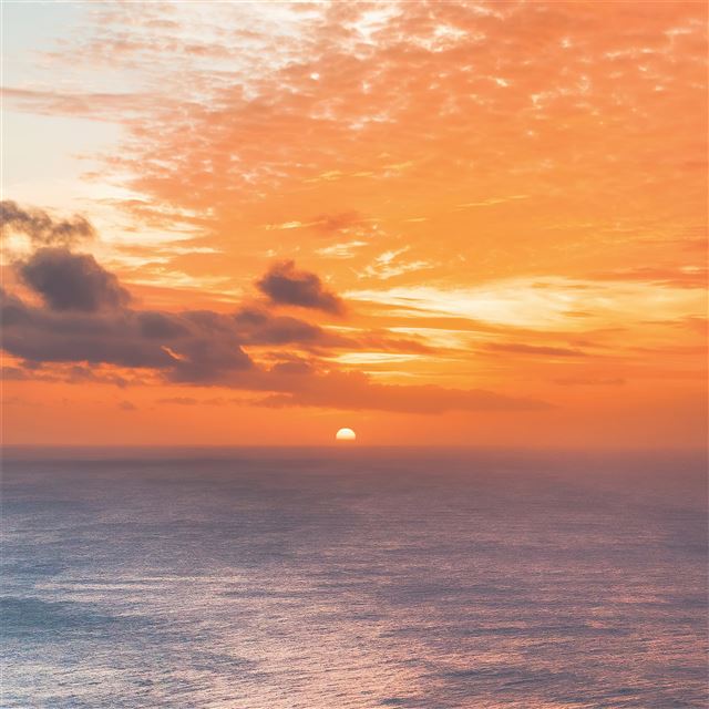 sunset at edge of ocean 5k iPad Air wallpaper 