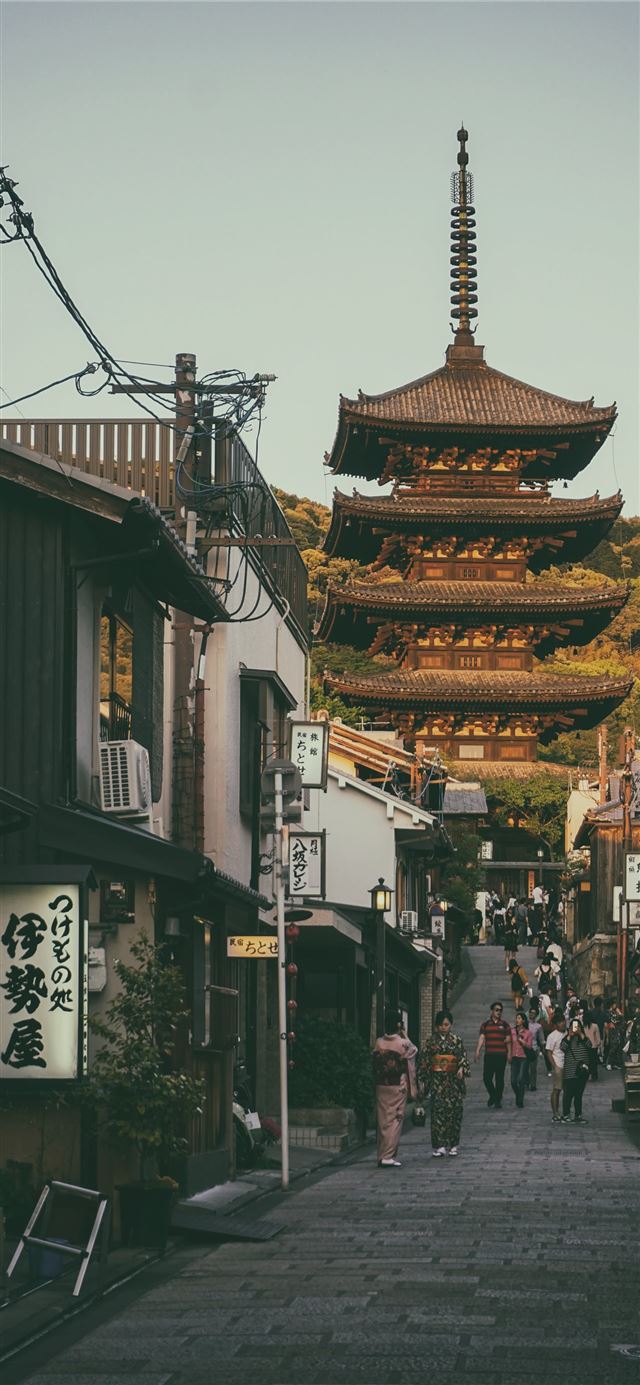 traditional house during daytime iPhone 11 wallpaper 