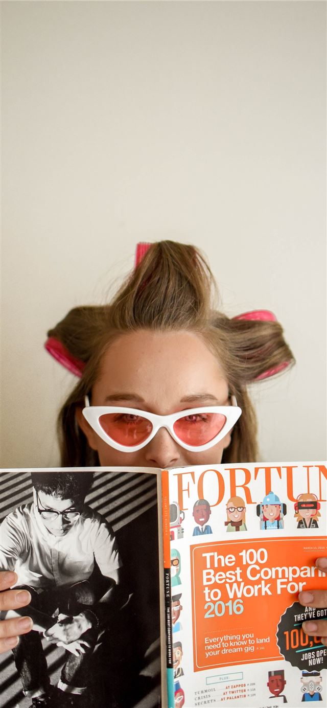 woman holding Fortune magazine iPhone 11 wallpaper 