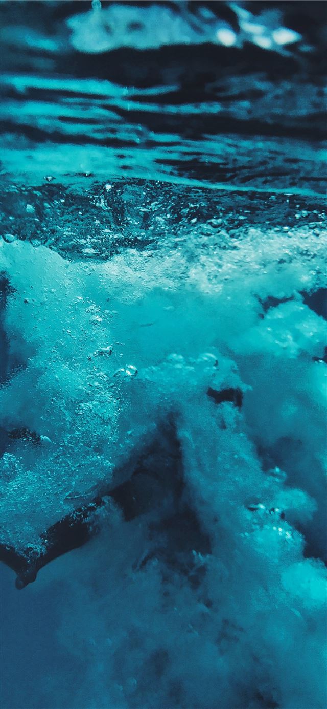 person dived on body of water iPhone 11 wallpaper 