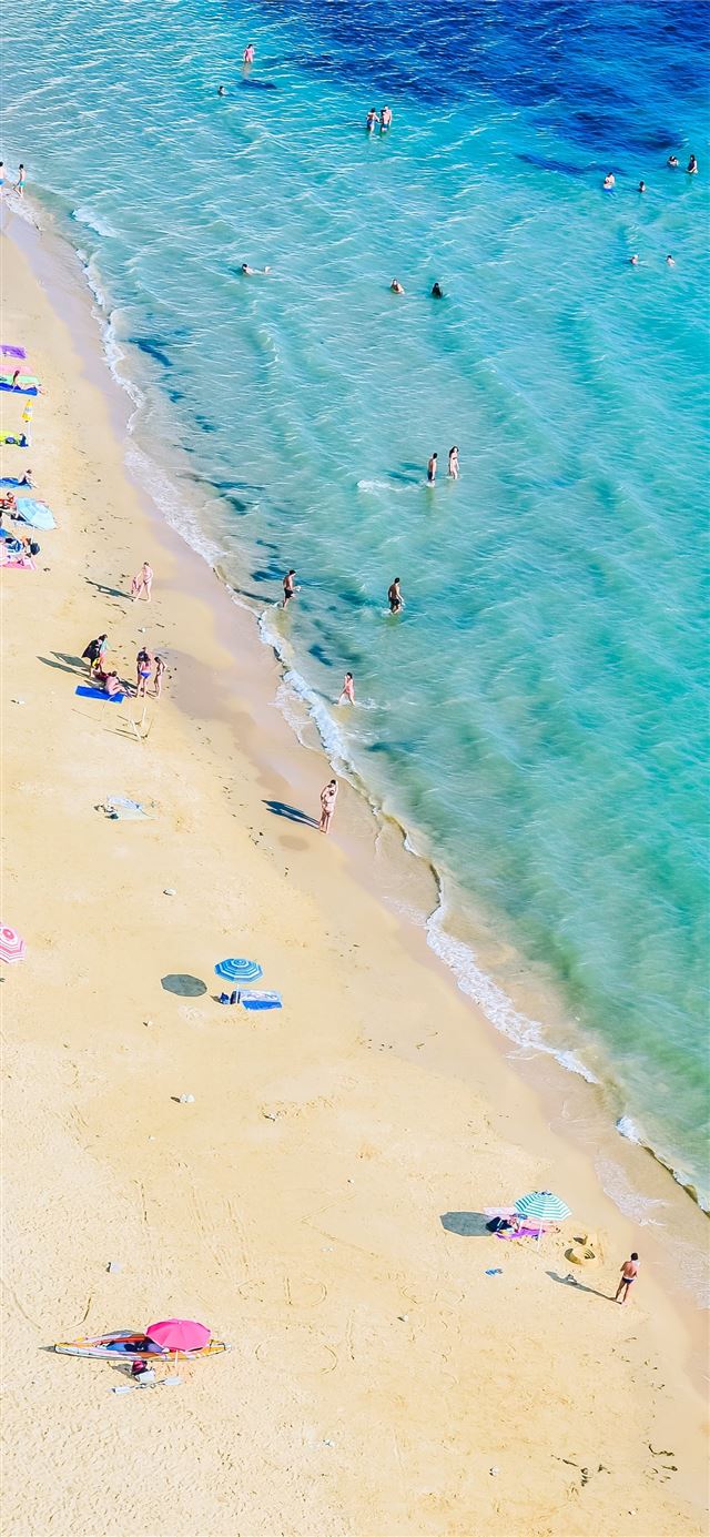 aerial photography of people on beach iPhone 8 wallpaper 