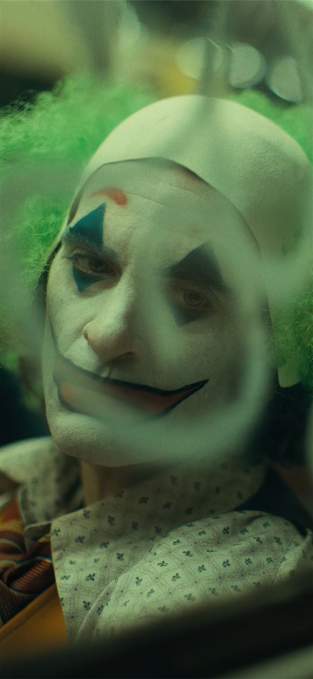 joker when stopped smiling iPhone 11 wallpaper 