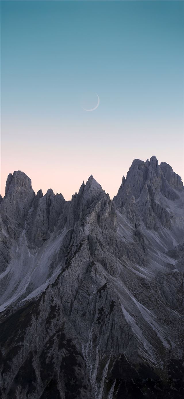 black and white mountains under blue sky iPhone 8 wallpaper 