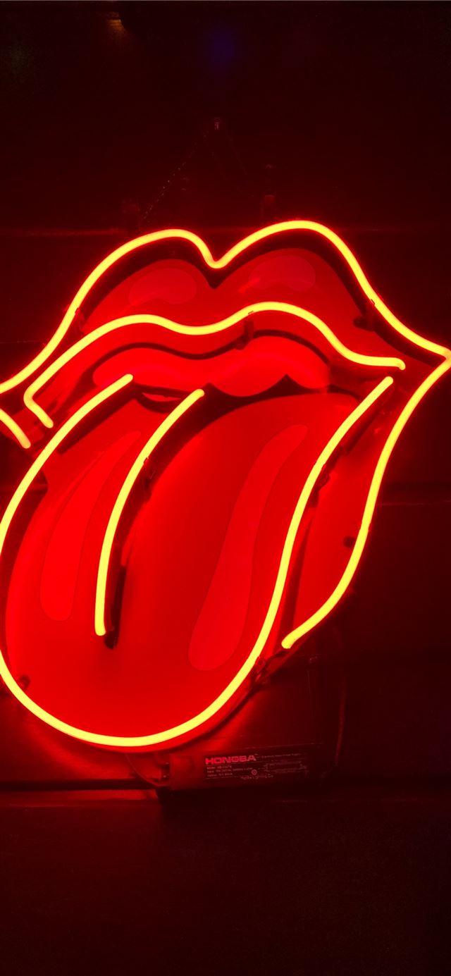 red tongue out neon light signage turned on iPhone 8 wallpaper 