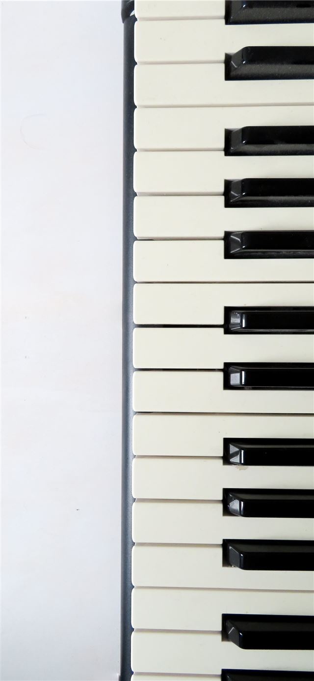 white and black piano keyboard iPhone 11 wallpaper 